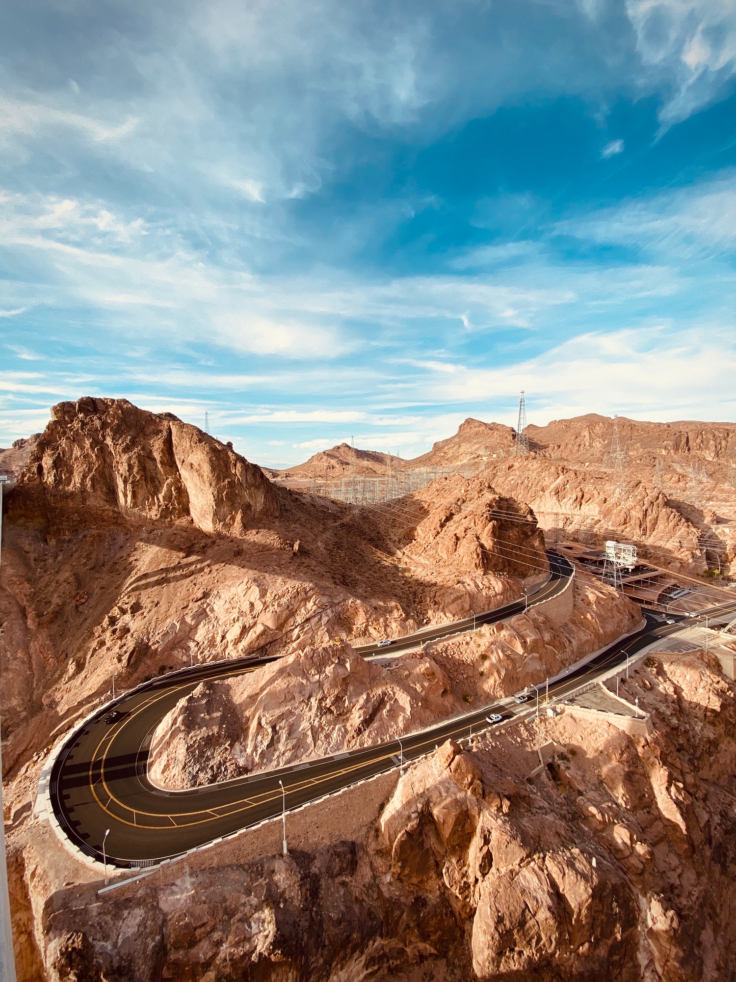 Blue skies over a road in the desert.